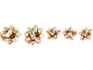 Five shiny gold gift bows of various sizes on a black background.