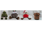 Festive Christmas plush toys shaped like a tree, pudding, robin, and highland cow.