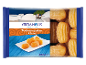 Packet of Greek syrup sweets, with a Greek landscape background and a plate of sweets.