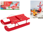 Red wooden elf sleigh with string and packaging.