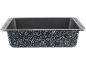 Black baking dish with white speckled design and silver rim.