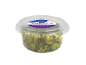 Grilled green olives in garlic-herb marinade in a clear plastic container.