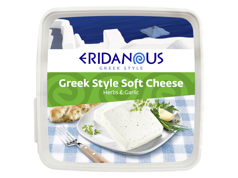 Greek style soft cheese with herbs and garlic, with bread and fork on a checkered napkin.