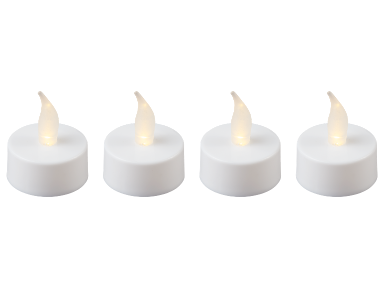 Four white LED candles with flickering flames.