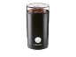 Black coffee grinder with whole coffee beans and a transparent lid.