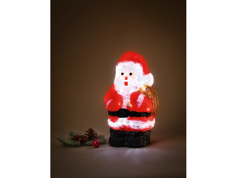 Light-up Santa Claus figure with fir branches and pine cones.