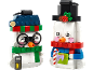 Two colorful toy brick snowmen as Christmas decorations.