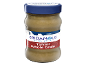 A jar of Greek style whole grain tahini with a blue lid.