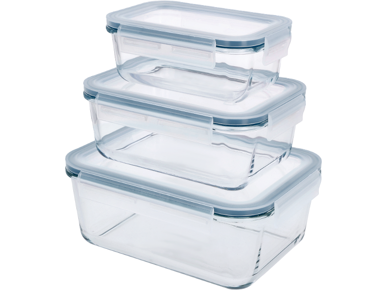 Set of three stacked glass food containers with clear plastic lids.