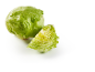 Fresh iceberg lettuce, one whole head and one quarter cut, on a white background.