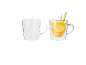 Two Silvercrest thermal mugs, one empty and one with lemon tea