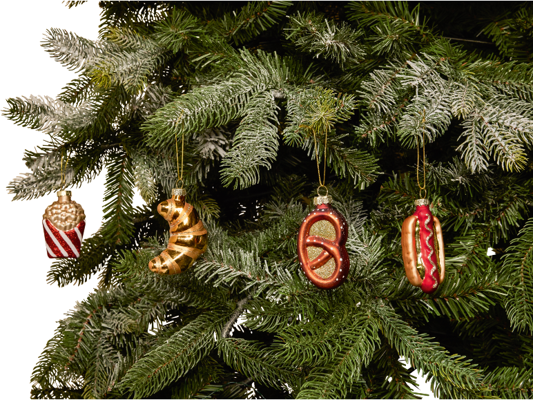 Christmas ornaments shaped like popcorn, croissant, pretzel, and hot dog on a Christmas tree.