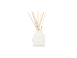 Ceramic reed diffuser in the shape of a house