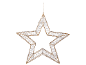 Golden Christmas star with white thread, hanging against a black background.