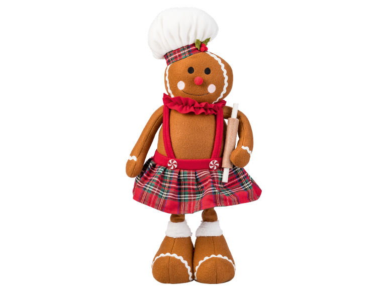 Gingerbread doll with a chef's hat, plaid skirt, and rolling pin.