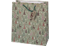 Christmas gift bag with reindeer and Christmas tree pattern on a green background.