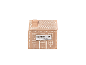Gingerbread house-shaped scented candle.