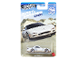 White 1995 sports car model in racing-themed packaging.