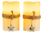 Two decorative LED candles with jute rope and star pendant.