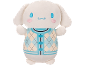 White plush toy wearing a blue and beige argyle vest