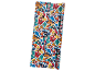 Gift wrap featuring cartoon characters like a mouse, duck, and dog in a colorful pattern.