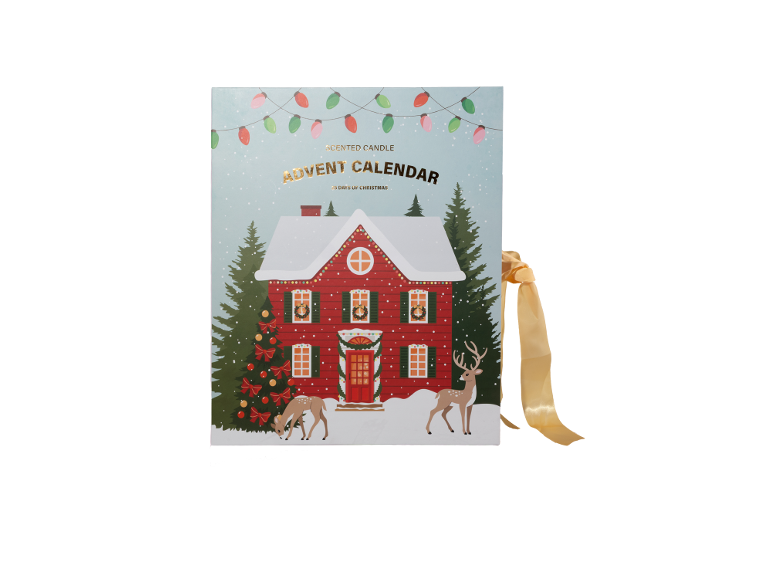 Scented candle advent calendar in the shape of a festive house with a ribbon