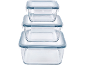 Set of three stackable glass food containers with blue plastic lids.
