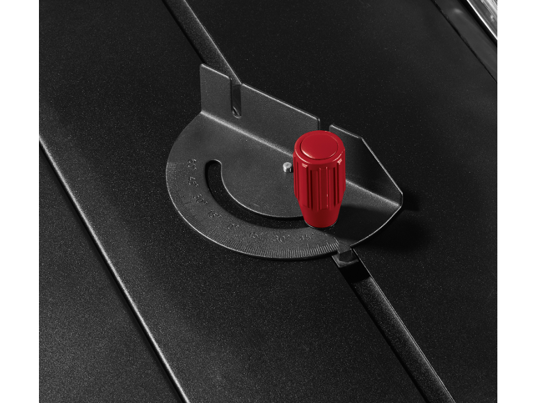 Black angle ruler with a red adjustment knob on a textured surface.