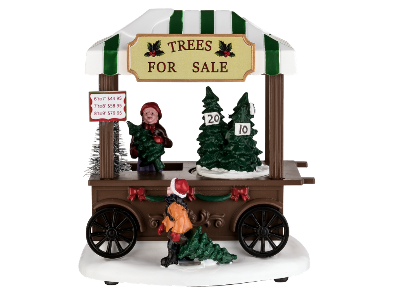 Christmas decoration of a wooden cart with Christmas trees for sale.
