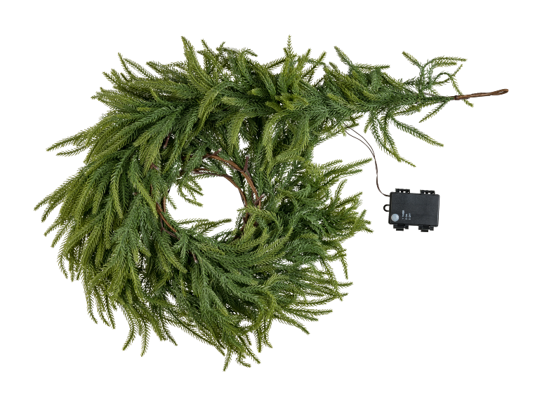 Green artificial Christmas garland with a battery pack on a black background