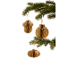 Brown paper Christmas decorations hanging from a green fir tree.