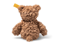 Soft brown teddy bear seen from behind.