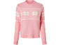 Pink sweater with white Fair Isle snowflake pattern.