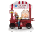 Christmas cotton candy cart with figures and 'COTTON CANDY', 'RIDES 10¢' signs.