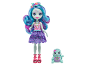 Doll and turtle pet, both with floral patterns and bright colors.