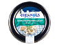 Greek style cheese cubes with herbs in oil, served on a blue and white checkered cloth.