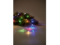 Christmas garland with colorful lights on a dark background.