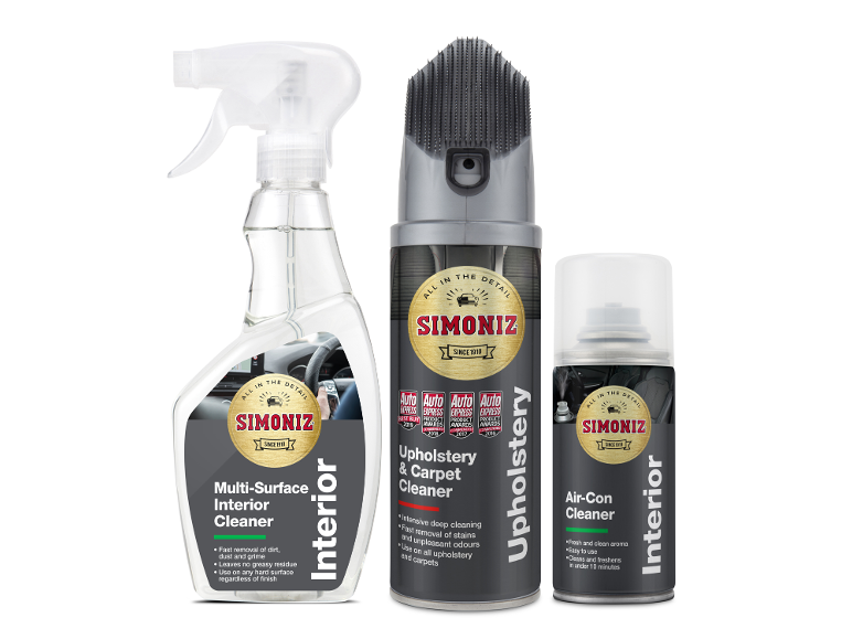 Car cleaning kit with interior cleaner, upholstery cleaner, and air-con cleaner.
