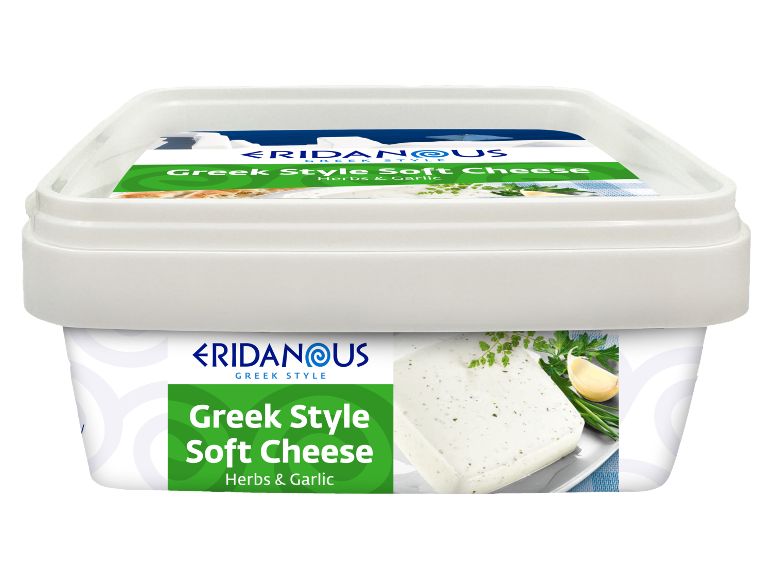 Greek style soft cheese with herbs and garlic in a white tub.