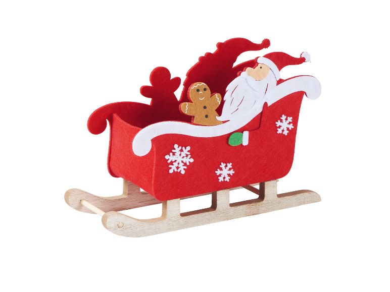 Red Christmas sleigh with Santa Claus and a gingerbread man.