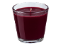 Red scented candle in a glass jar