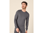 Man in dark grey long-sleeved thermal top and matching bottoms