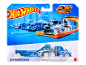Blue toy truck and trailer set, 'Semi Rodger Dodger' model, in blister packaging.
