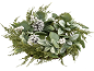 Winter wreath with frosted pinecones, white berries, and green foliage on a black background.