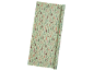 Christmas wrapping paper with trees and deer in pastel tones.