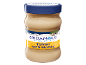 A jar of Greek style tahini with honey, featuring a blue and yellow label.