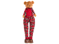 Teddy bear in red plaid overalls and knitted sweater, with brown shoes.