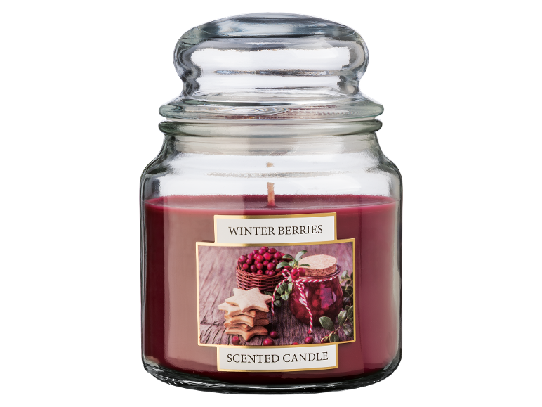 Winter berries scented candle in a glass jar with a lid.