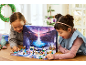 Two girls playing with a winter-themed toy advent calendar.