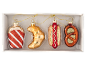 Christmas ornaments shaped like a popcorn bucket, croissant, hot dog, and pretzel.
